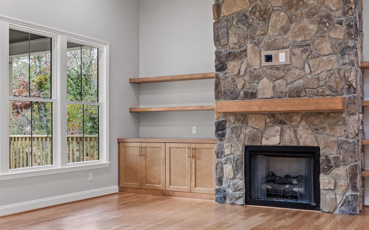 Modern living room with a custom stone fireplace